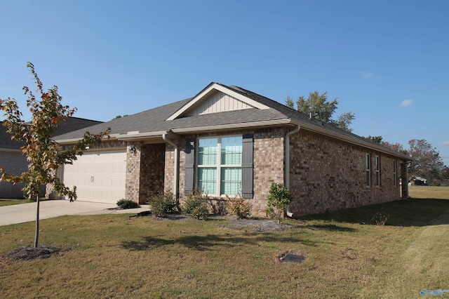 single story home featuring a garage and a front lawn