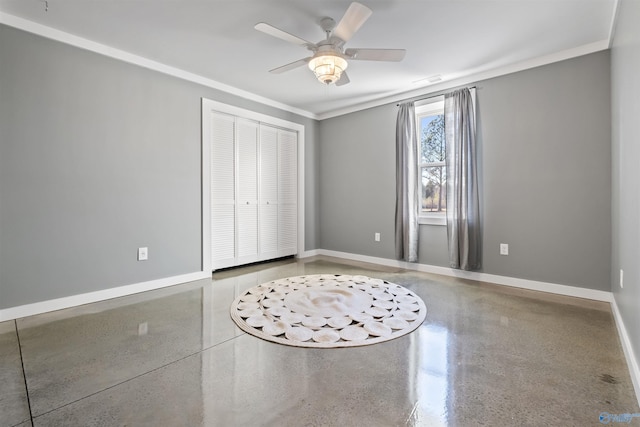 unfurnished bedroom with ceiling fan, a closet, and ornamental molding