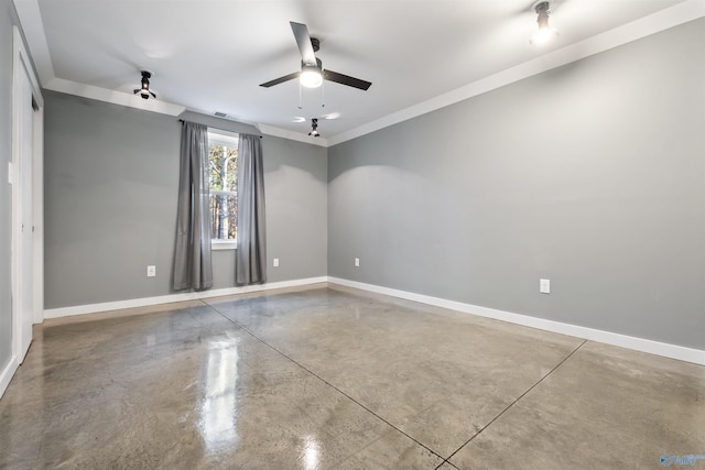 unfurnished room featuring concrete floors, ceiling fan, and ornamental molding