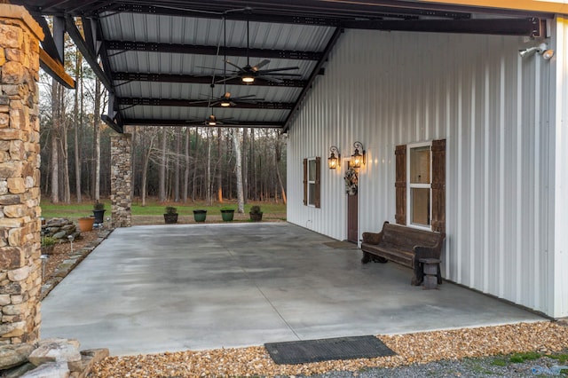 view of patio featuring ceiling fan