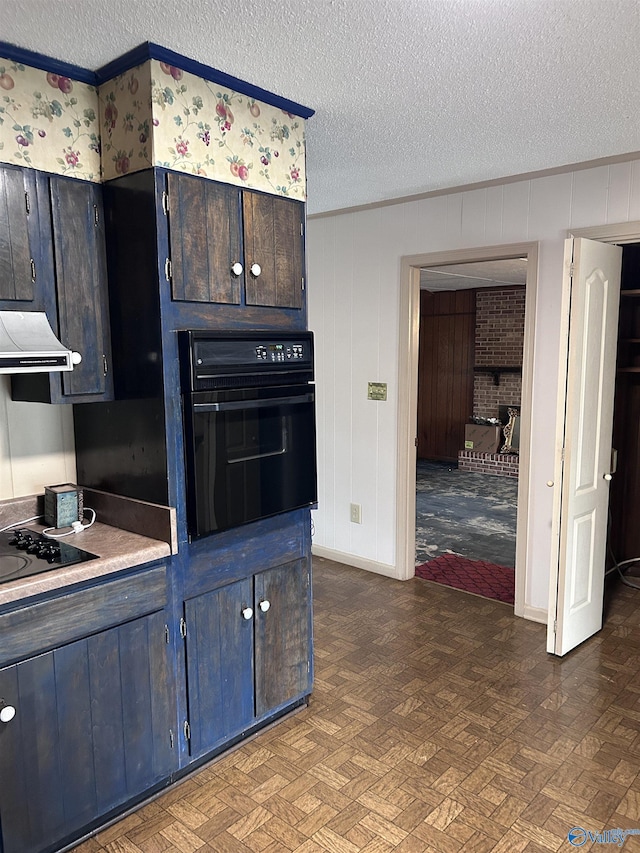 765 County Road 745, Cedar Bluff, AL 35959 - kitchen featuring light countertops, a textured ceiling, range hood, and black appliances