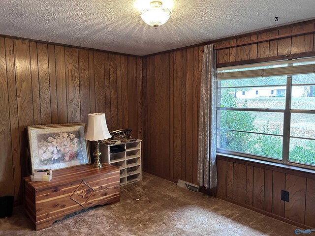765 County Road 745, Cedar Bluff, AL 35959 - interior space with wooden walls, a textured ceiling, and visible vents