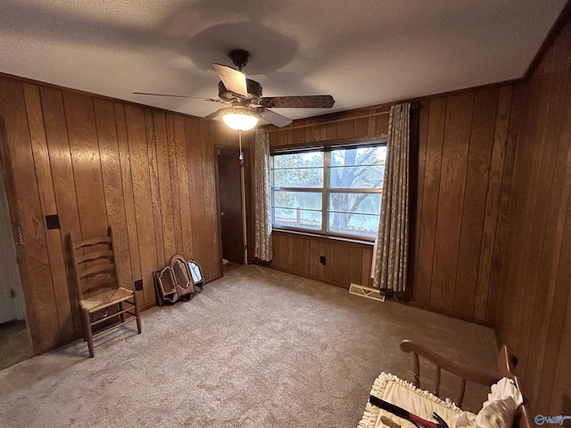 765 County Road 745, Cedar Bluff, AL 35959 - unfurnished room with light colored carpet, ceiling fan, and wooden walls