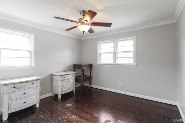 interior space featuring dark wood finished floors, visible vents, ceiling fan, and baseboards