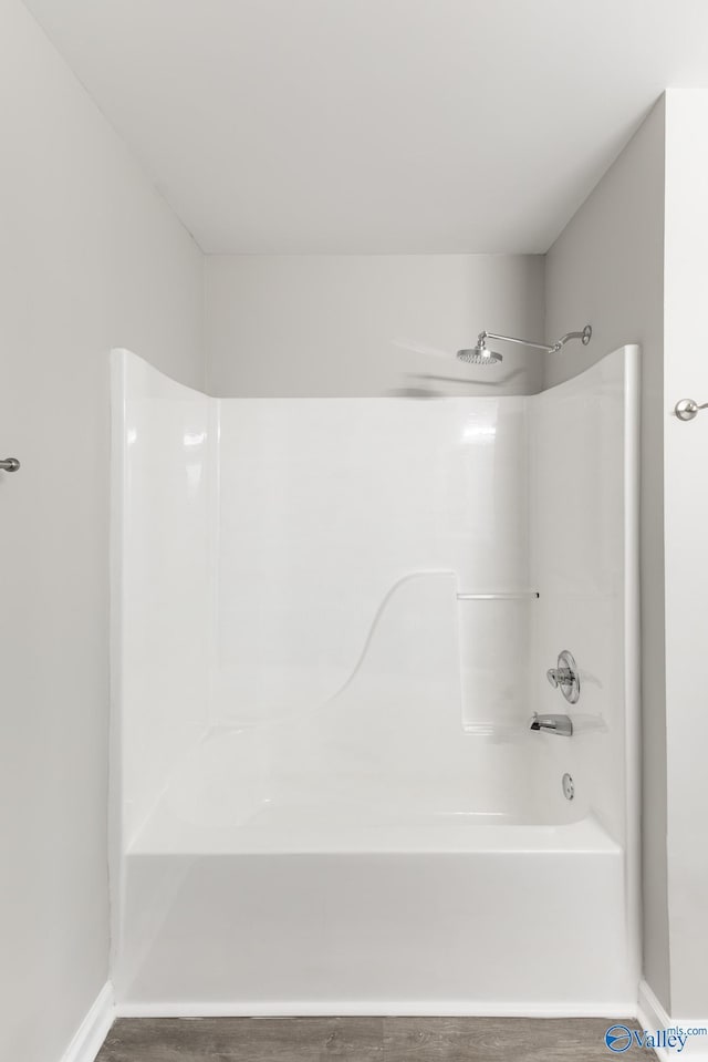 bathroom with shower / bathing tub combination