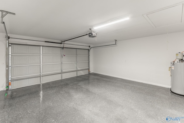 garage with water heater and a garage door opener