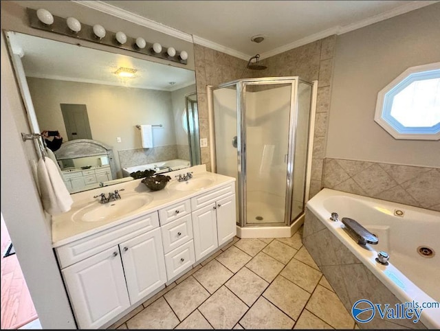 bathroom with vanity, tile patterned flooring, crown molding, and plus walk in shower