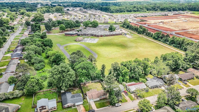birds eye view of property with a residential view