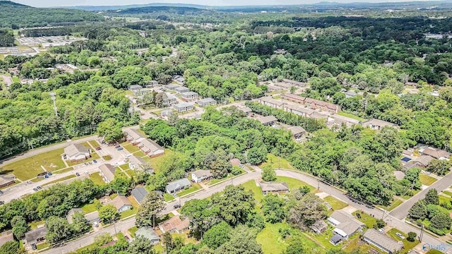 aerial view featuring a view of trees