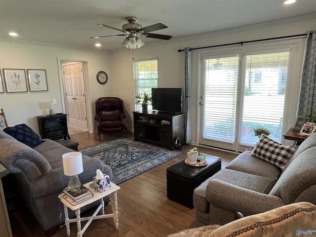 living room with recessed lighting, ceiling fan, crown molding, and wood finished floors
