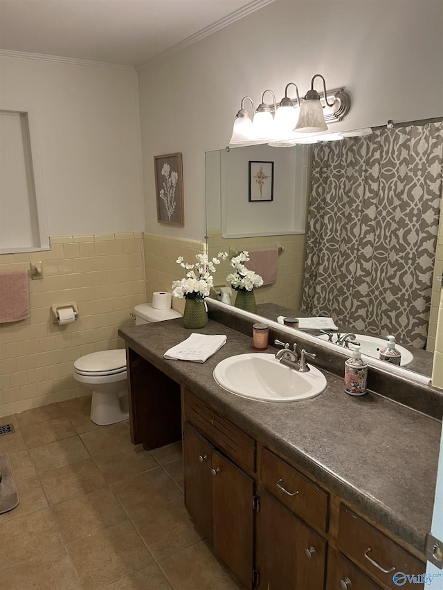 bathroom featuring ornamental molding, toilet, tile walls, vanity, and tile patterned floors