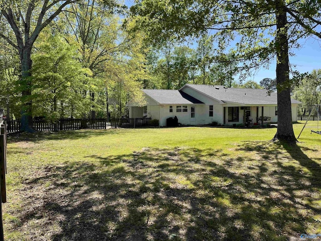 view of yard with fence
