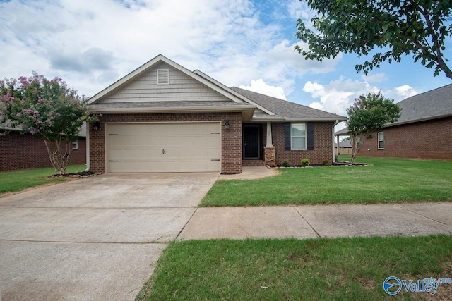 view of front facade with a garage and a front yard