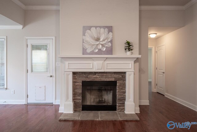 interior details featuring wood-type flooring, a fireplace, and ornamental molding