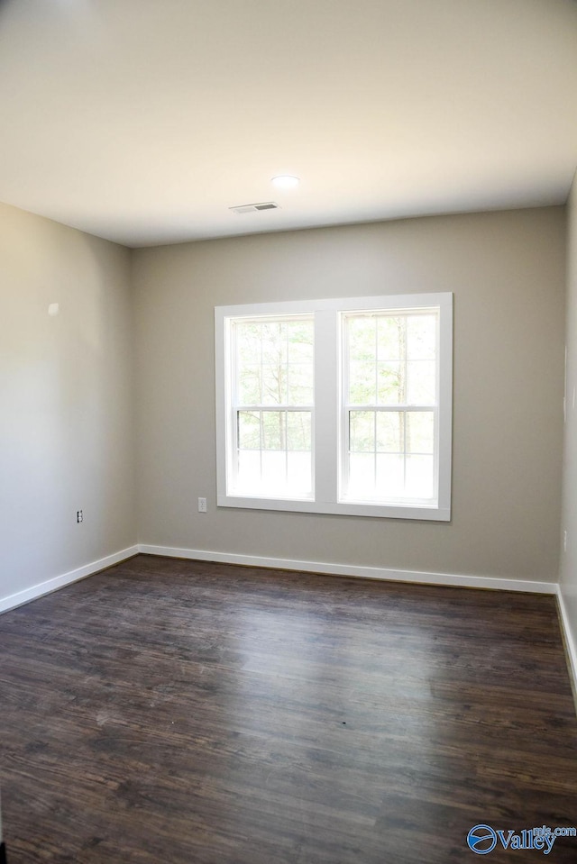 6200 Dalewood Ln, Guntersville, AL 35976 - empty room featuring baseboards and dark wood-style flooring