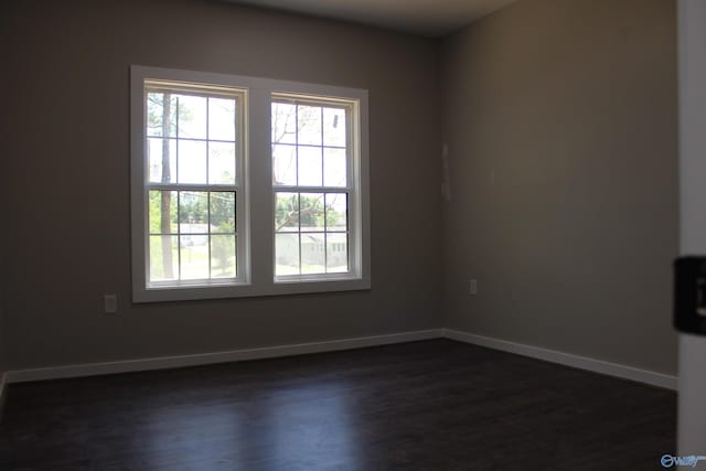 6200 Dalewood Ln, Guntersville, AL 35976 - spare room featuring plenty of natural light, dark wood-style floors, and baseboards