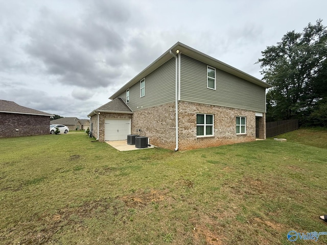 101 River Springs Ct, New Market, AL 35761 - rear view of property featuring brick siding and cooling unit