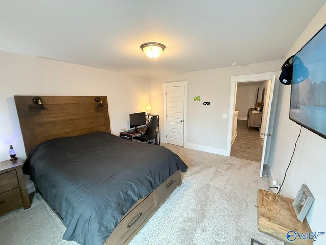 101 River Springs Ct, New Market, AL 35761 - bedroom with light carpet and baseboards