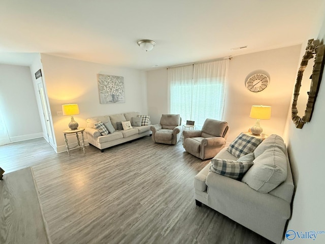 101 River Springs Ct, New Market, AL 35761 - living room featuring wood finished floors and baseboards
