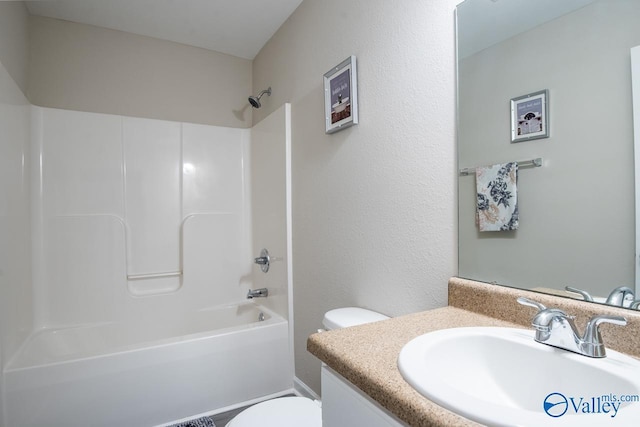 full bathroom with vanity, toilet, and shower / bath combination