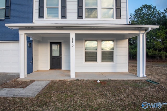 doorway to property with a porch