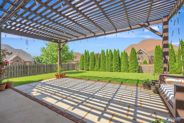 view of patio featuring a pergola and fence