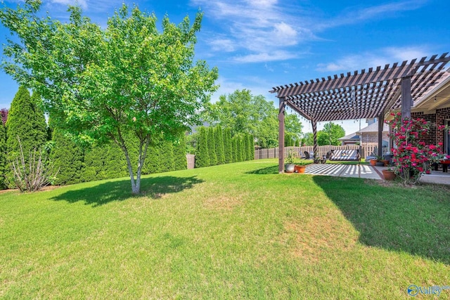 view of yard featuring a patio area, a pergola, and fence