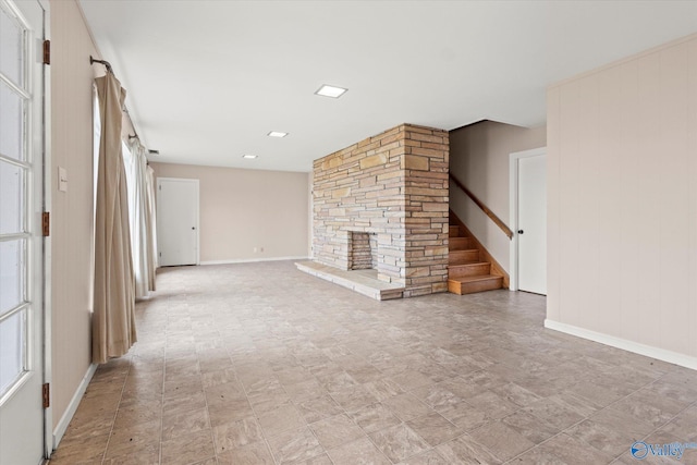 unfurnished living room with a fireplace