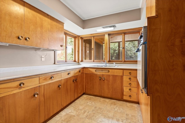 kitchen featuring sink and oven