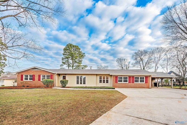 1300 Woodside Dr, Athens, AL 35611 - single story home featuring driveway, brick siding, a carport, and a front yard