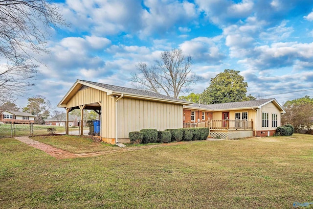 exterior space featuring a yard and a deck