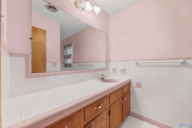 11303 Crestfield Dr, Huntsville, AL 35803 - bathroom with vanity, wainscoting, and tile patterned floors