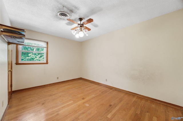 11303 Crestfield Dr, Huntsville, AL 35803 - empty room with light wood-style flooring, baseboards, and a ceiling fan