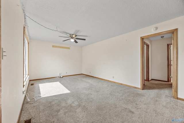 11303 Crestfield Dr, Huntsville, AL 35803 - unfurnished room featuring carpet, a ceiling fan, a textured ceiling, and baseboards