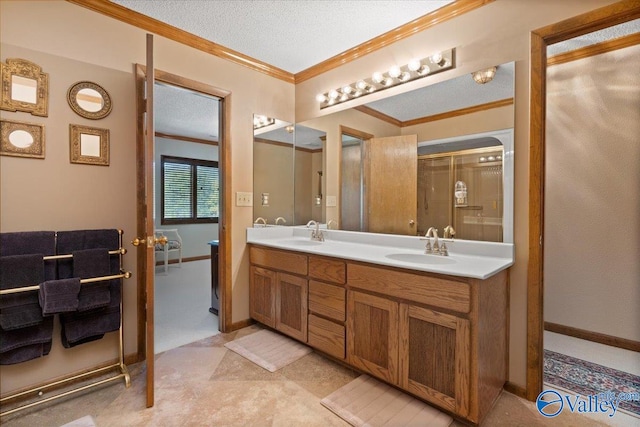 bathroom featuring walk in shower, ornamental molding, a textured ceiling, and vanity