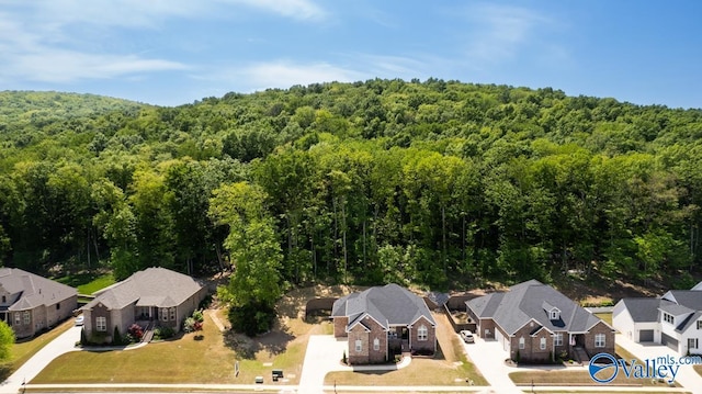 bird's eye view with a view of trees and a residential view