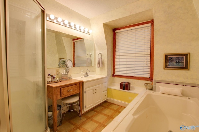 bathroom with vanity and plus walk in shower