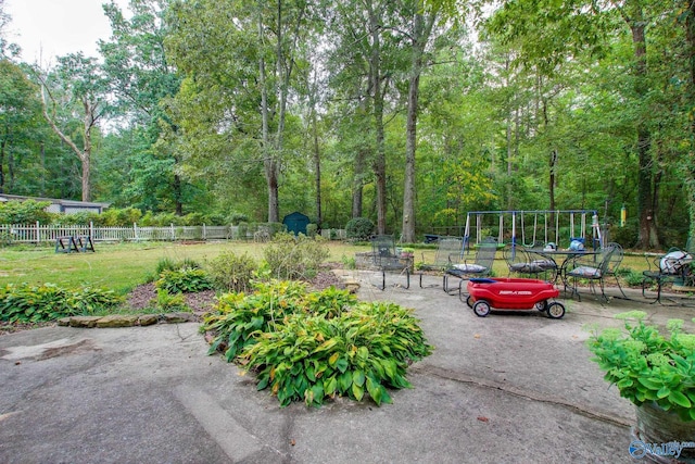 exterior space with a lawn and a patio area