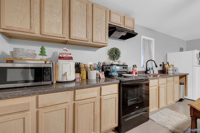 kitchen featuring electric range, light brown cabinets, white refrigerator, and sink