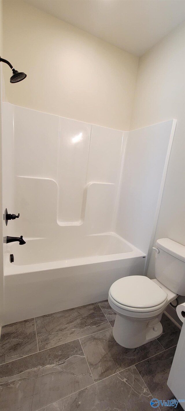 bathroom with  shower combination and toilet