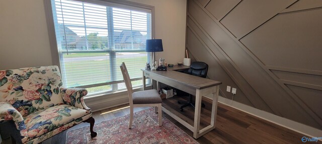 office area with a healthy amount of sunlight and wood-type flooring