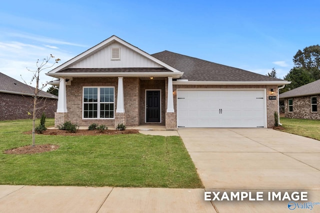 craftsman inspired home with a front lawn and a garage