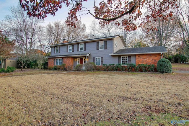 view of front of home with a front yard