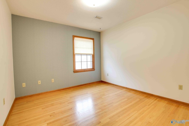 empty room featuring light hardwood / wood-style flooring