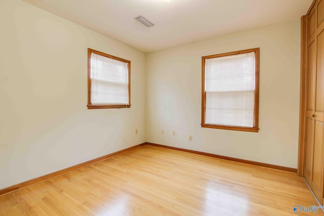 empty room featuring light hardwood / wood-style floors