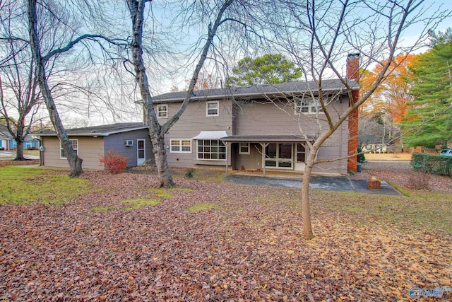 back of house featuring a patio area