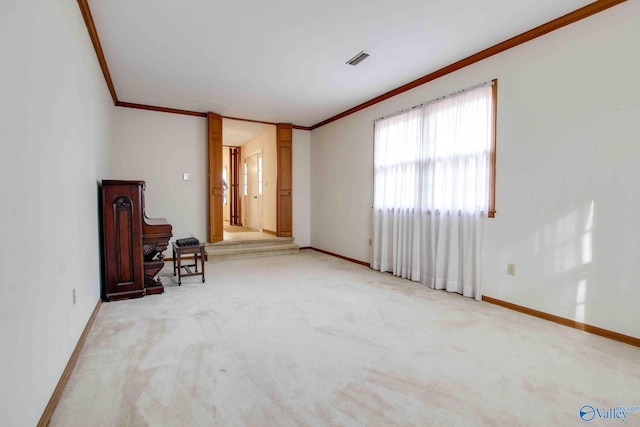 interior space featuring light carpet and ornamental molding