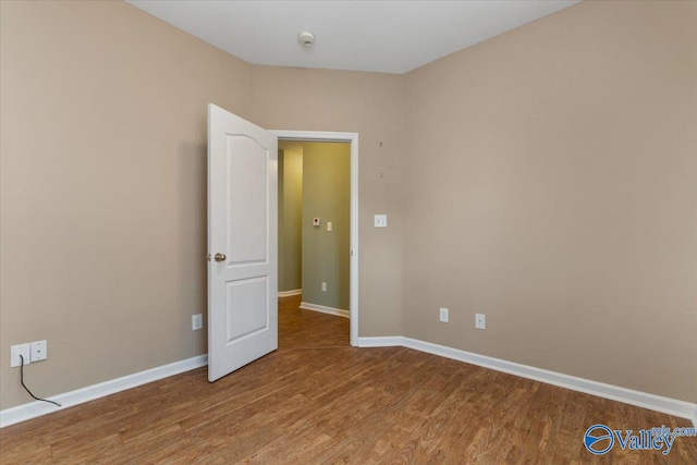 unfurnished room featuring light hardwood / wood-style flooring