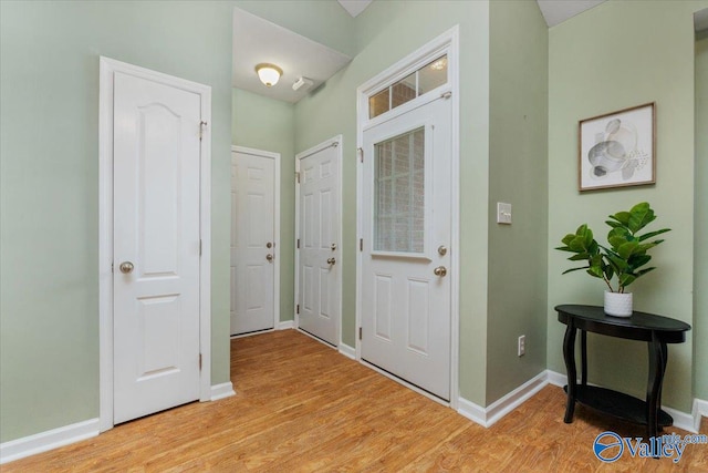 foyer entrance featuring light wood-type flooring