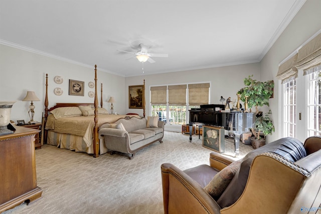 carpeted bedroom featuring ceiling fan, crown molding, and access to outside